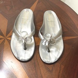 Adorable flip flops in silver w/lucite balls.